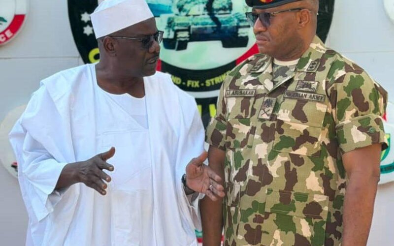 Mohammed Ndume with a Nigerian Army officer during a visit to the Operation Hadin Kai command in Maiduguri.