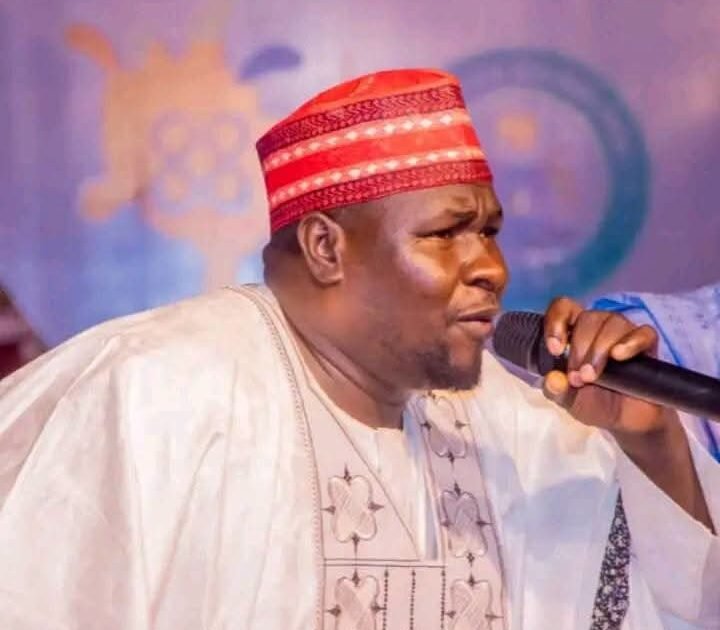 Hausa political singer Kosan Waka performing with a microphone