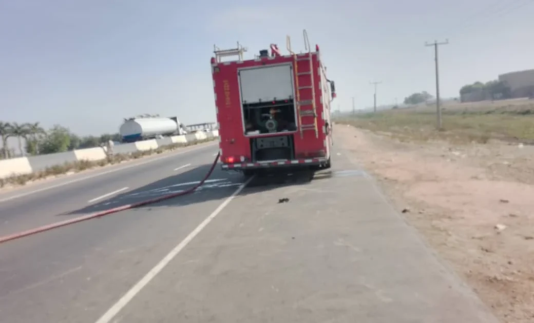 A fire truck on a road, used for the Kano fire-service report