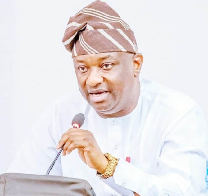 Festus Keyamo, Nigeria’s Minister of Aviation and Aerospace Development, speaking at a microphone