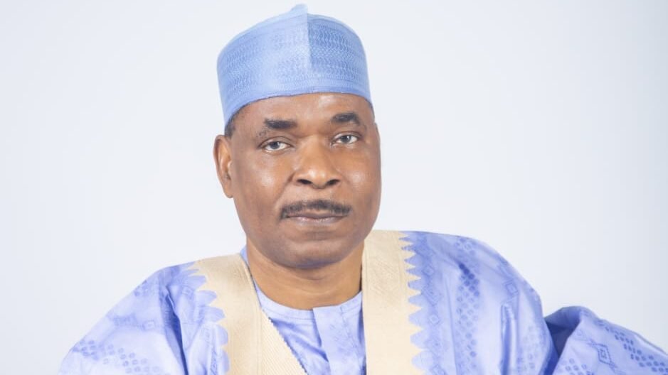 Former Inspector-General of Police Mohammed Adamu in a blue traditional cap