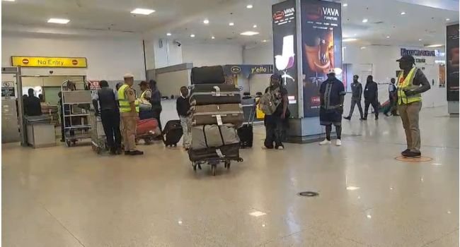 Nigerian returnees at the Murtala Muhammed International Airport in Lagos.