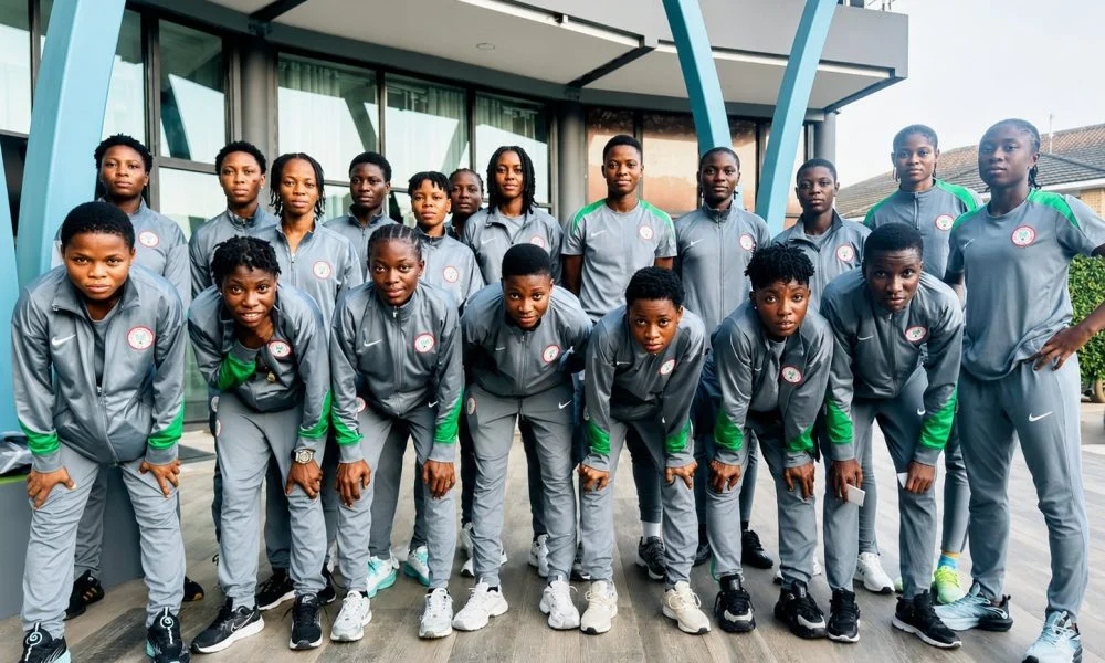 Nigeria Falconets players in team tracksuits.
