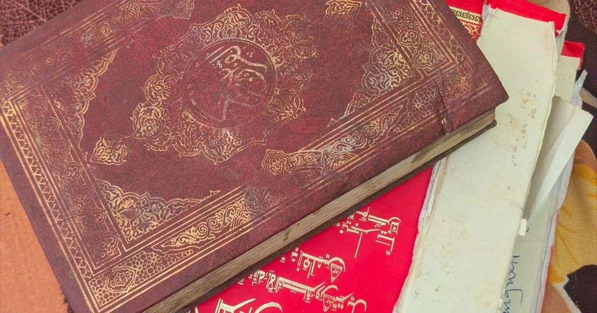 Source-origin Punch photo showing a Qur’an and papers linked to the report. Used carefully as exact source imagery for the alleged desecration arrest story.