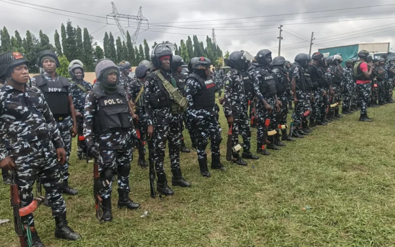 Source-origin Punch photo of police operatives assembled for election security, used for the Osun deployment story.
