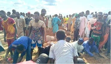 Residents gather at the Goronyo boat accident scene in Sokoto State after the fatal capsize