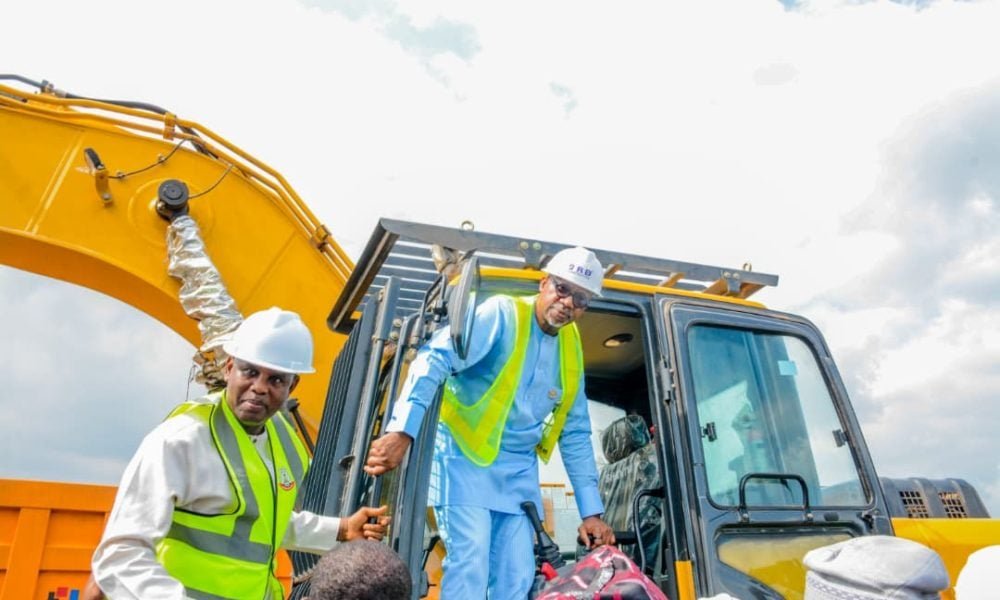 Officials beside construction machinery at the Ibadan-Ijebu-Ode road reconstruction flag-off