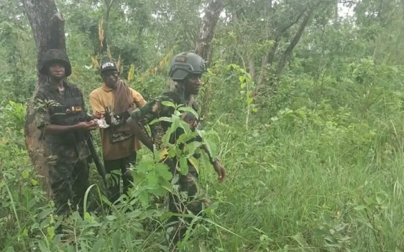 Military officers with one of the rescued Kogi kidnap victims. Source-origin image from Premium Times.