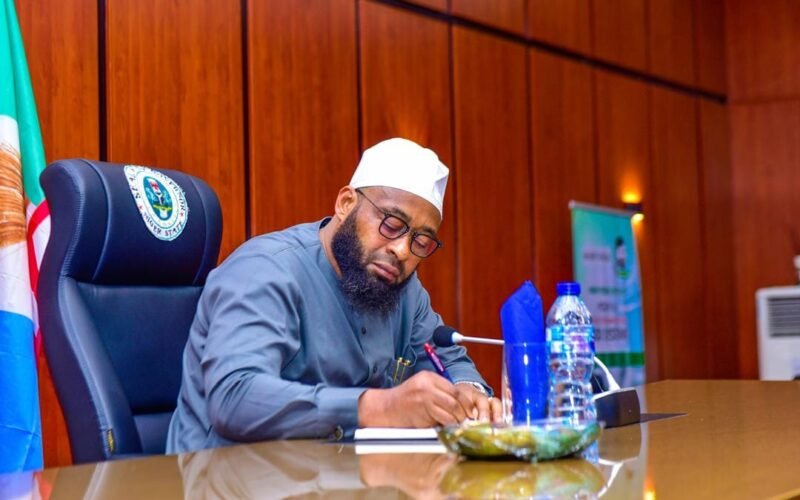 Niger State Governor Umaru Bago seated at a desk during an official engagement