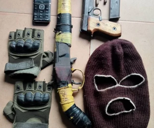 Recovered firearms, ammunition and other items displayed by Enugu police after the kidnap rescue
