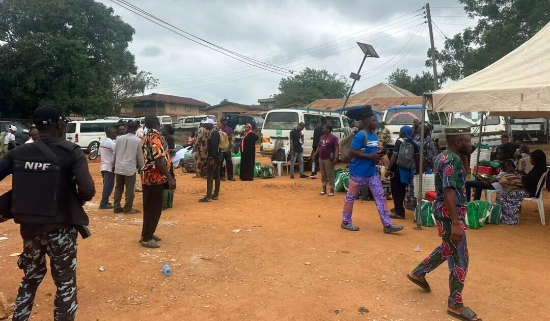 People and election materials at an Ejigbo polling area during the Osun governorship election