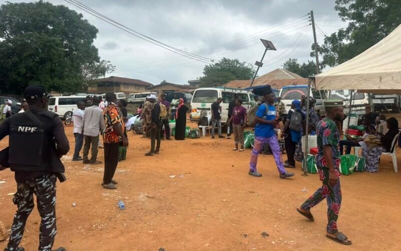 People and election materials at an Ejigbo polling area during the Osun governorship election