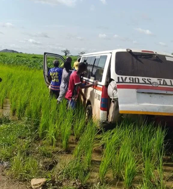 Rescued passengers beside a vehicle after the Zamfara abduction response.