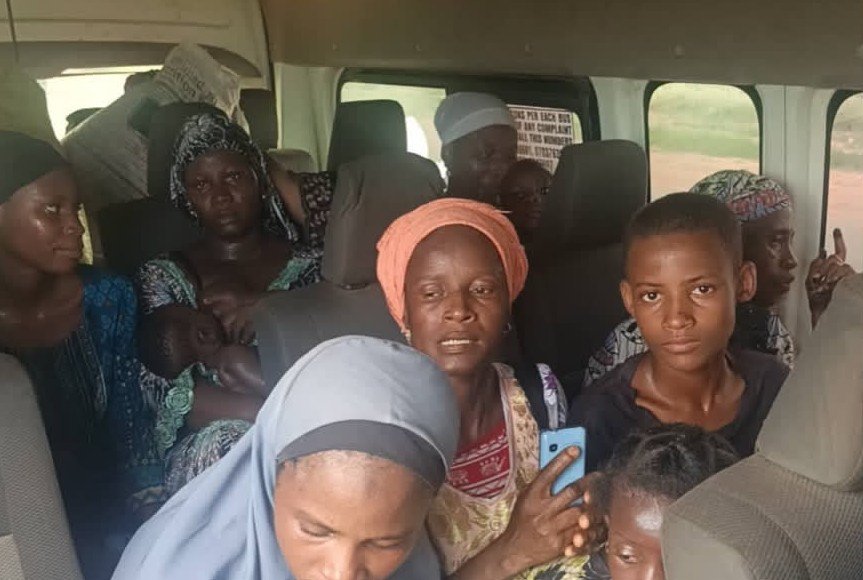 Rescued kidnap victims seated inside a vehicle after the Zamfara operation