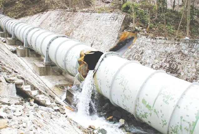 A damaged petroleum pipeline with a ruptured section