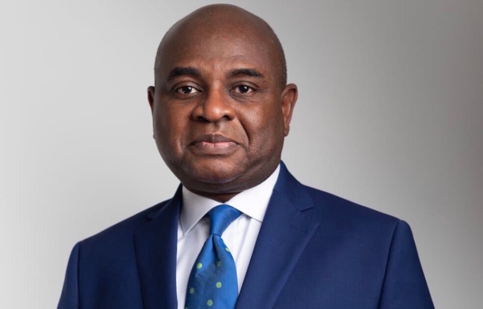 Kingsley Moghalu in a blue suit and tie