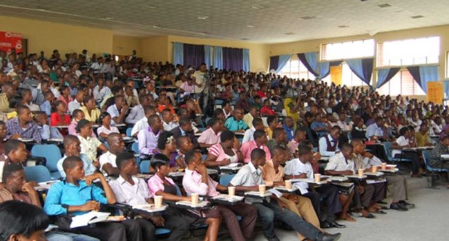 Students in a lecture hall, used as a contextual image for the NELFUND loan repayment clarification