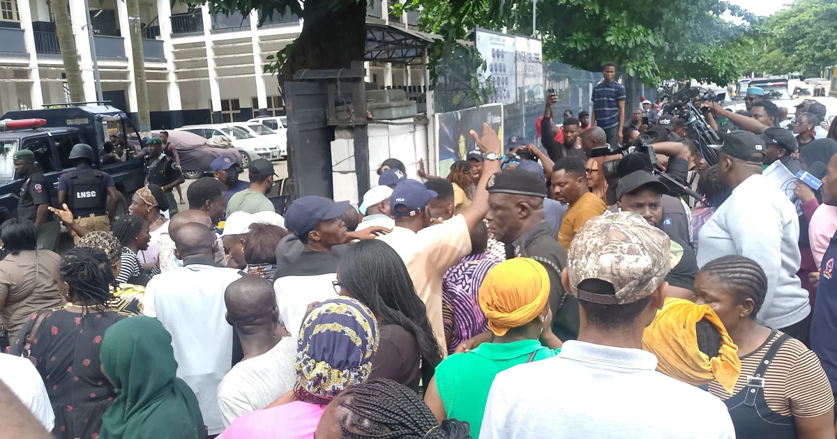 People gathered at the King’s College Lagos gate during the staff protest over the concession plan.