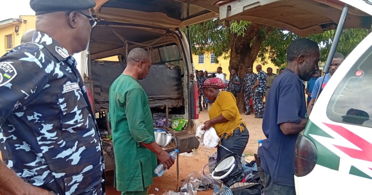 Police and rescued passengers beside a vehicle after a Benue kidnap rescue