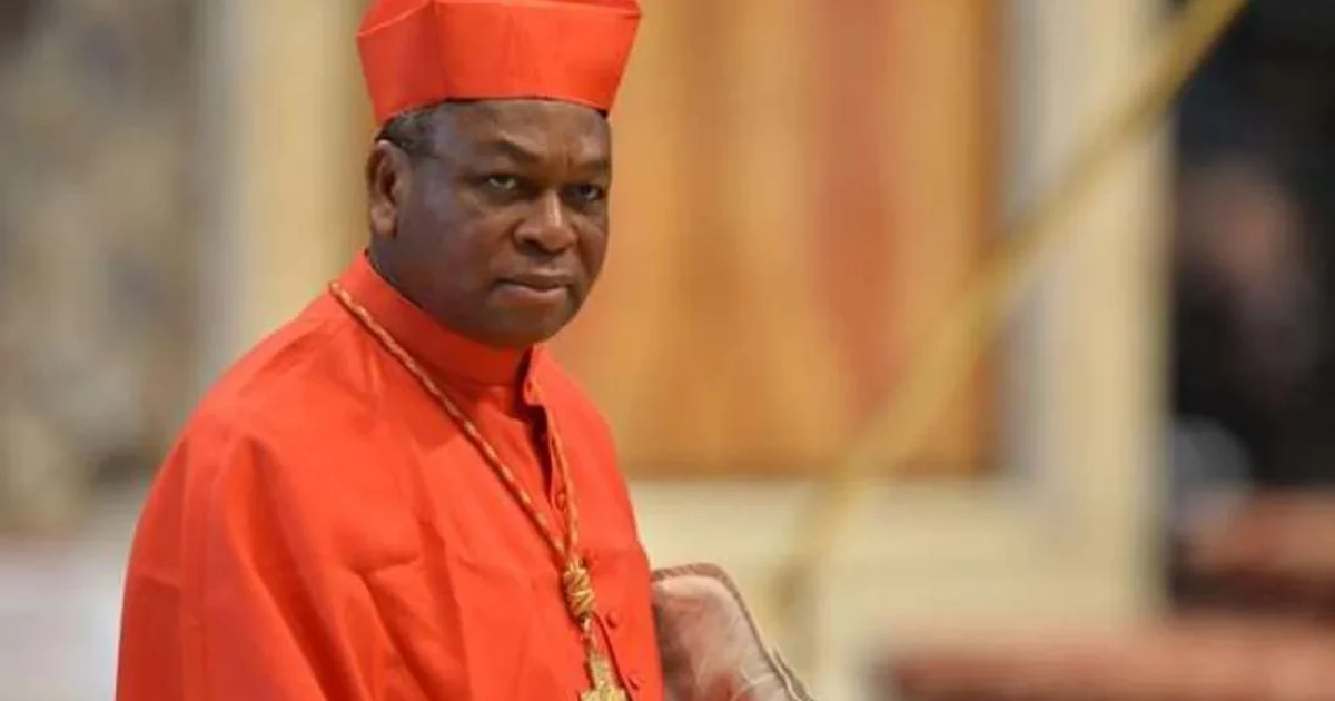 Cardinal John Onaiyekan in red clerical dress