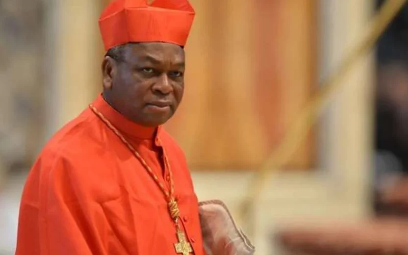 Cardinal John Onaiyekan in red clerical dress