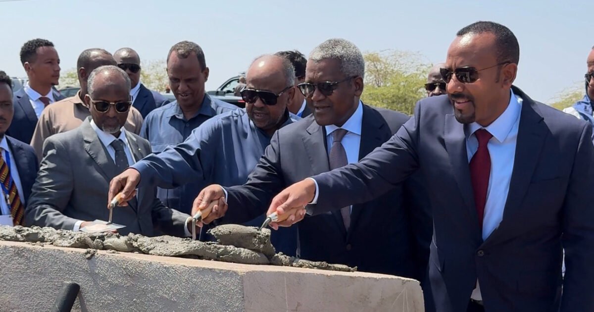 Officials ceremonially laying mortar at the Damarjog–Dewele pipeline groundbreaking in Djibouti