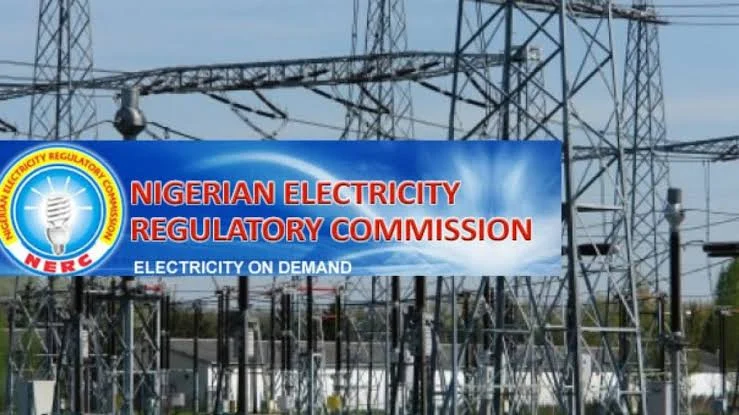 Nigerian Electricity Regulatory Commission sign beside electricity infrastructure