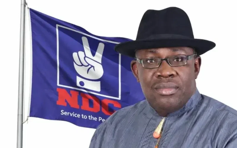 Seriake Dickson with an NDC flag