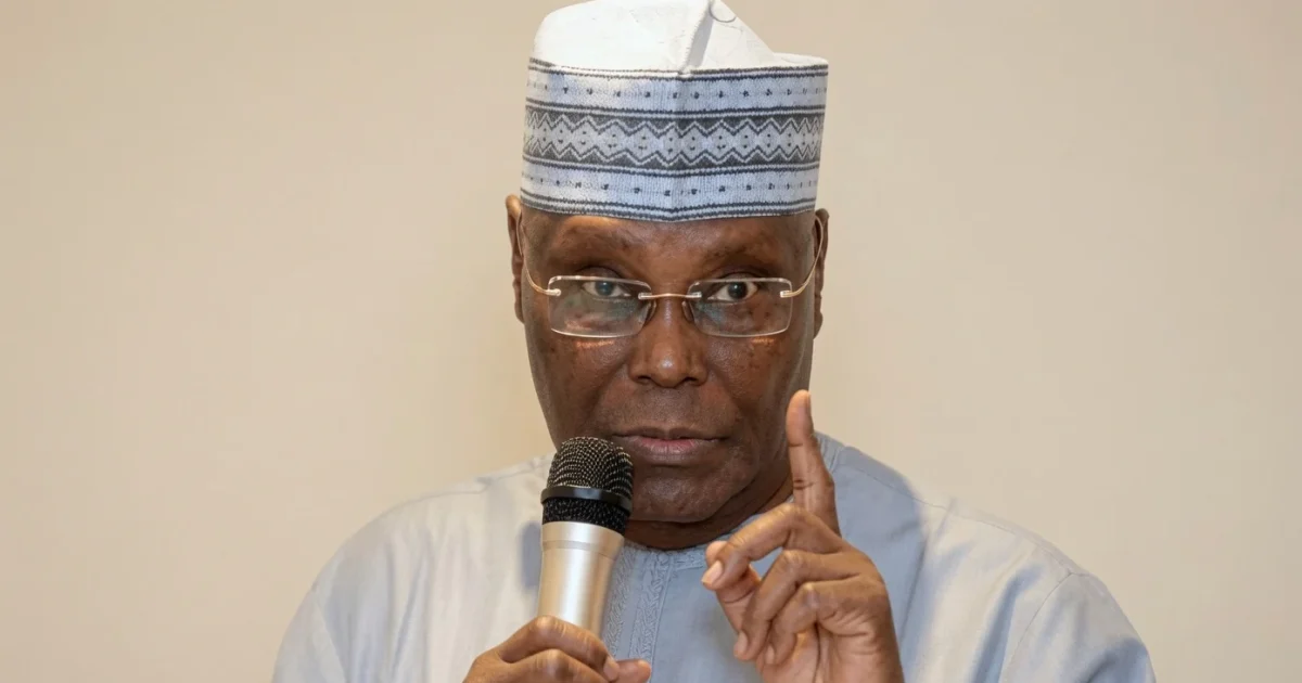 Former Vice President Atiku Abubakar speaking into a microphone