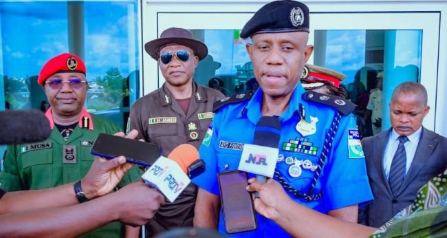 Plateau State Police Commissioner Ayodeji Faniyan speaks to journalists after a security meeting in Jos.
