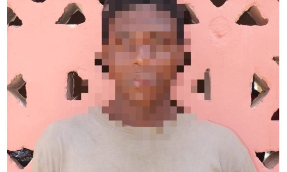 Blurred photograph of an adult man published with the Suleja church-guard arrest report