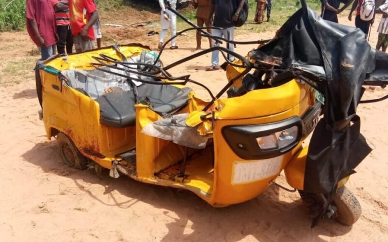 Damaged yellow tricycle after the fatal Adamawa crash on the Yola-Girei Road