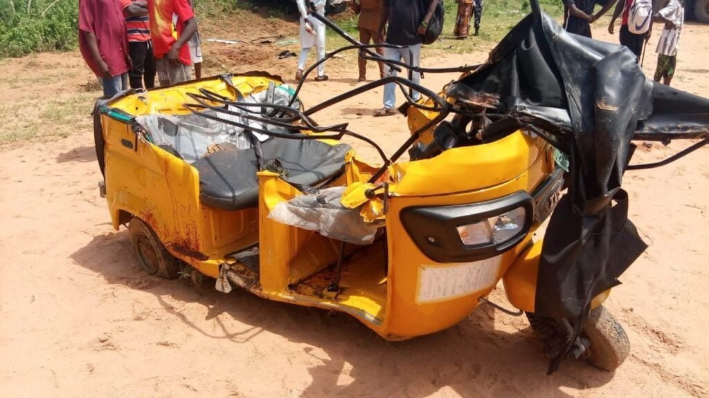 Damaged yellow tricycle after the fatal Adamawa crash on the Yola-Girei Road