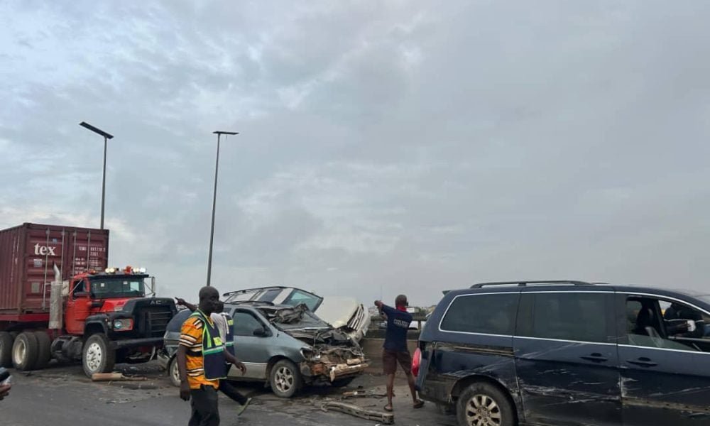 Container truck and damaged vehicles after the Kara Bridge crash