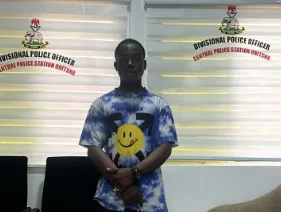 Teenage kidnapping victim photographed at a police office after rescue