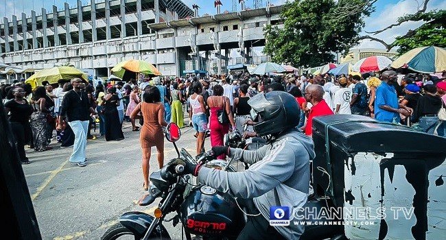 Crowd outside Tafawa Balewa Square during the Black Market Guinness World Record screening in Lagos.