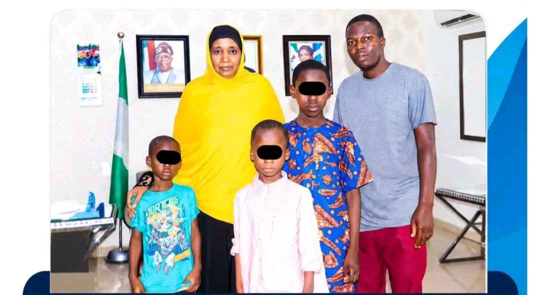 NAPTIP Director-General Binta Bello with rescued children whose faces are obscured