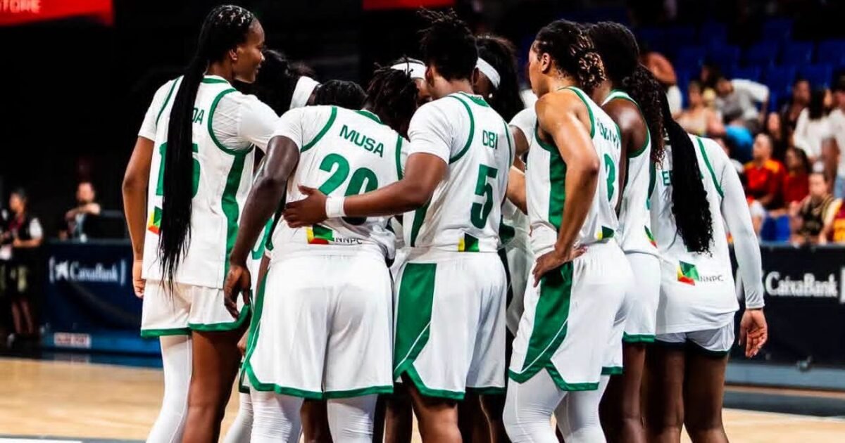 Nigeria’s D’Tigress players in a huddle during a basketball game.
