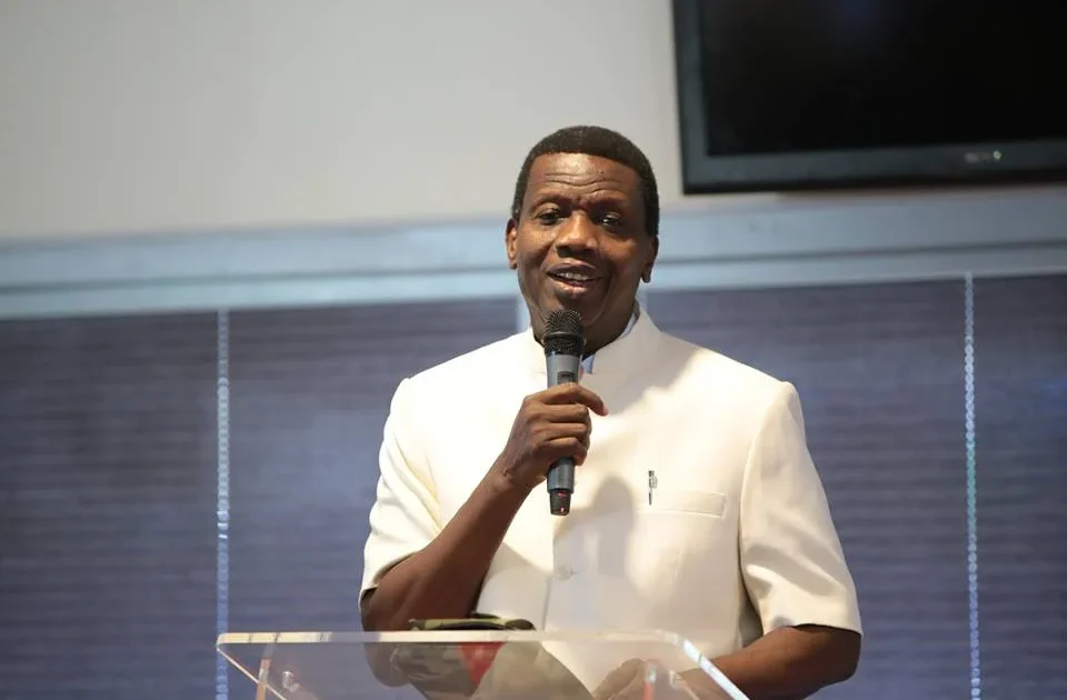 Pastor Enoch Adeboye speaking at a lectern