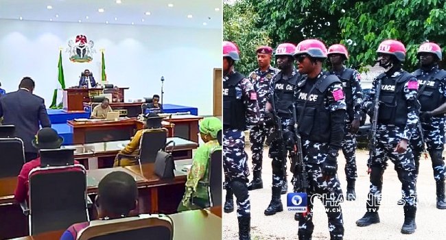 Rivers State House of Assembly chamber during proceedings, with police officers deployed outside