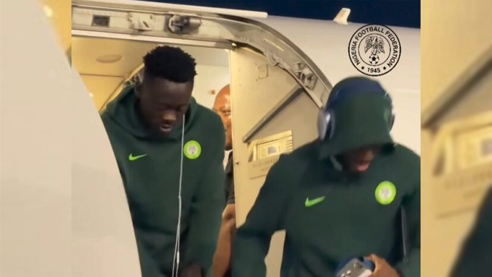 Super Eagles players step off an aircraft after arriving in Bissau for an AFCON qualifier.