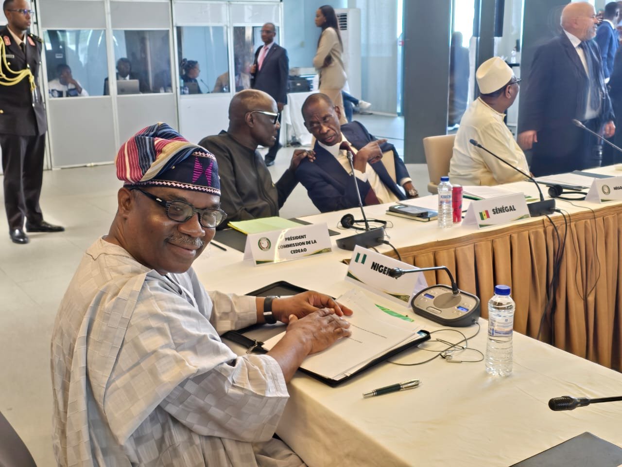 A delegate seated behind a Nigeria nameplate at the ECOWAS–AES talks in Dakar