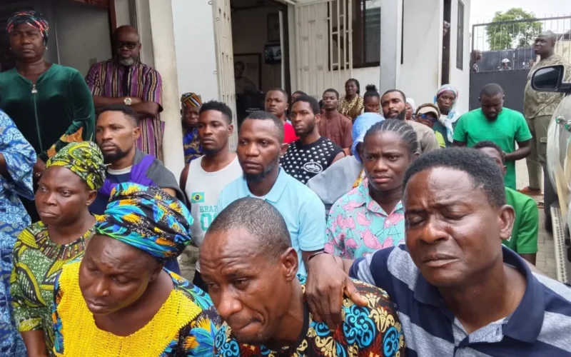 Relatives of abducted prospective corps members gathered outside a residence in Ibadan