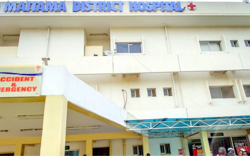 Exterior of Maitama District Hospital in Abuja, with its name above the entrance.