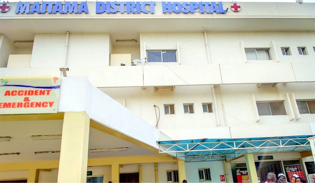 Exterior of Maitama District Hospital in Abuja, with its name above the entrance.