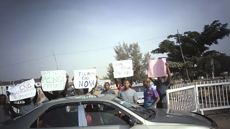 Motorists holding placards calling for CNG supply to resume in Minna