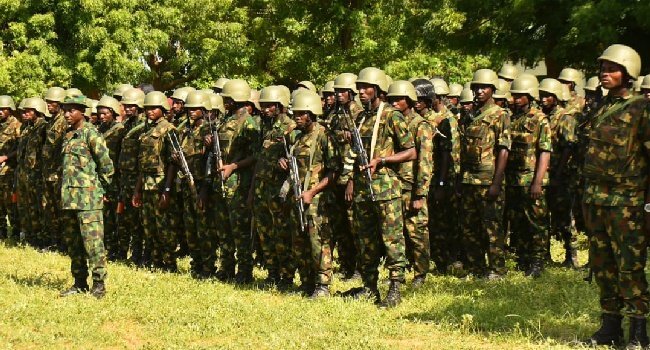 Nigerian Army soldiers standing in formation during a briefing