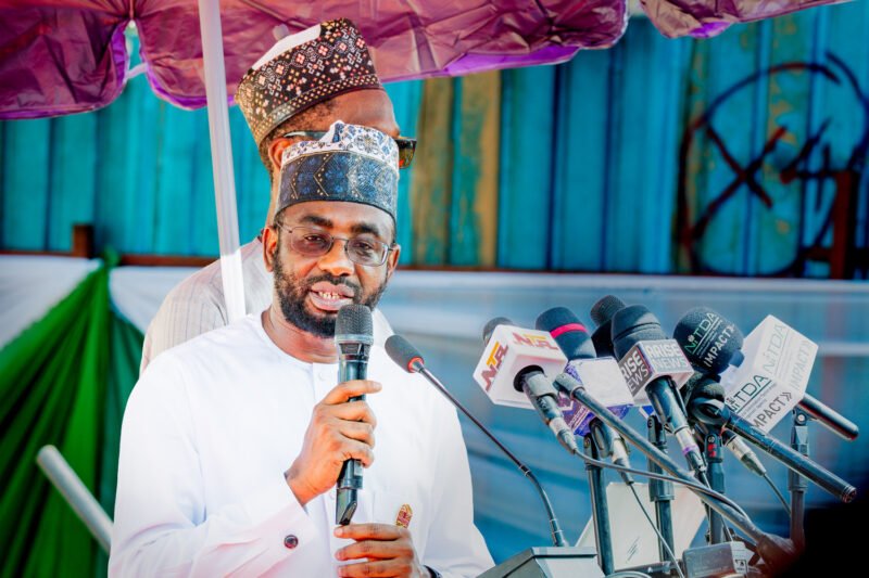 The Director-General of NITDA speaks at a microphone during an official event.